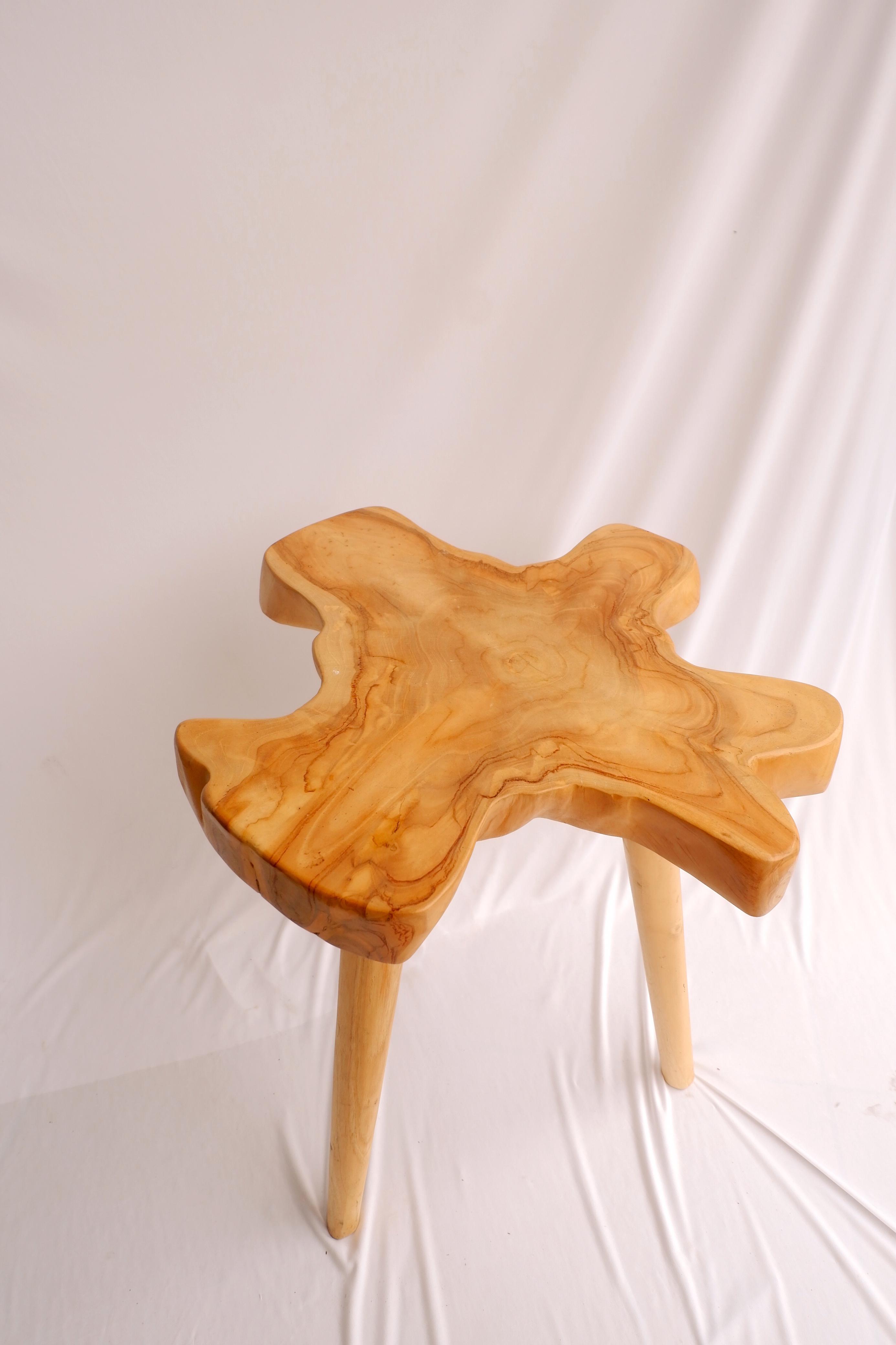 Teak stools by Djavacraftsman